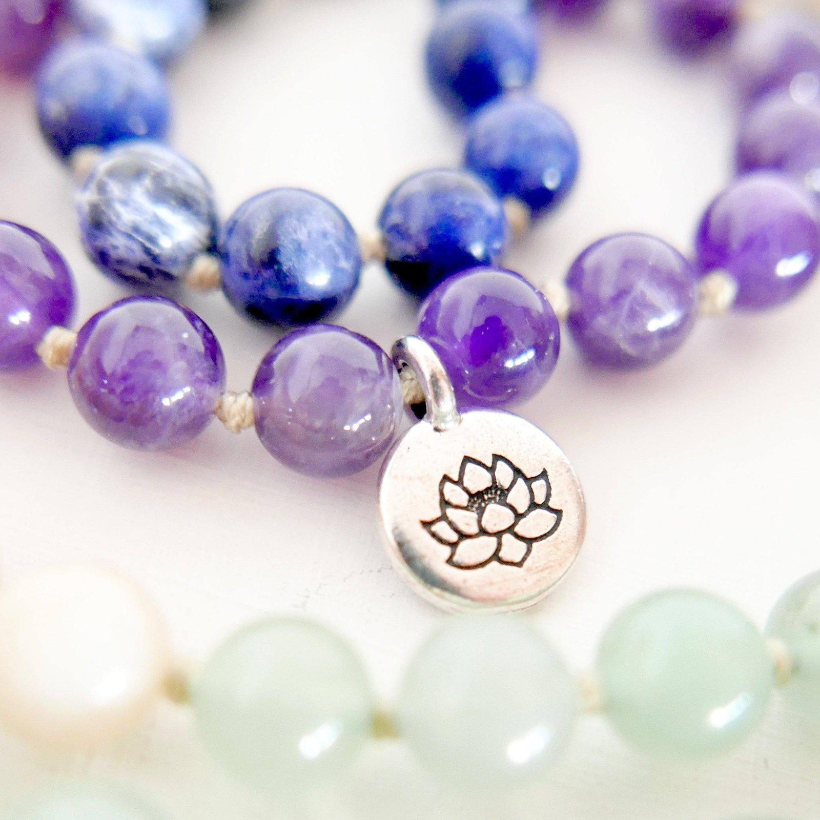 Silver plated and bronze TierraCast charms for a custom mala necklace - MeraKalpa Malas