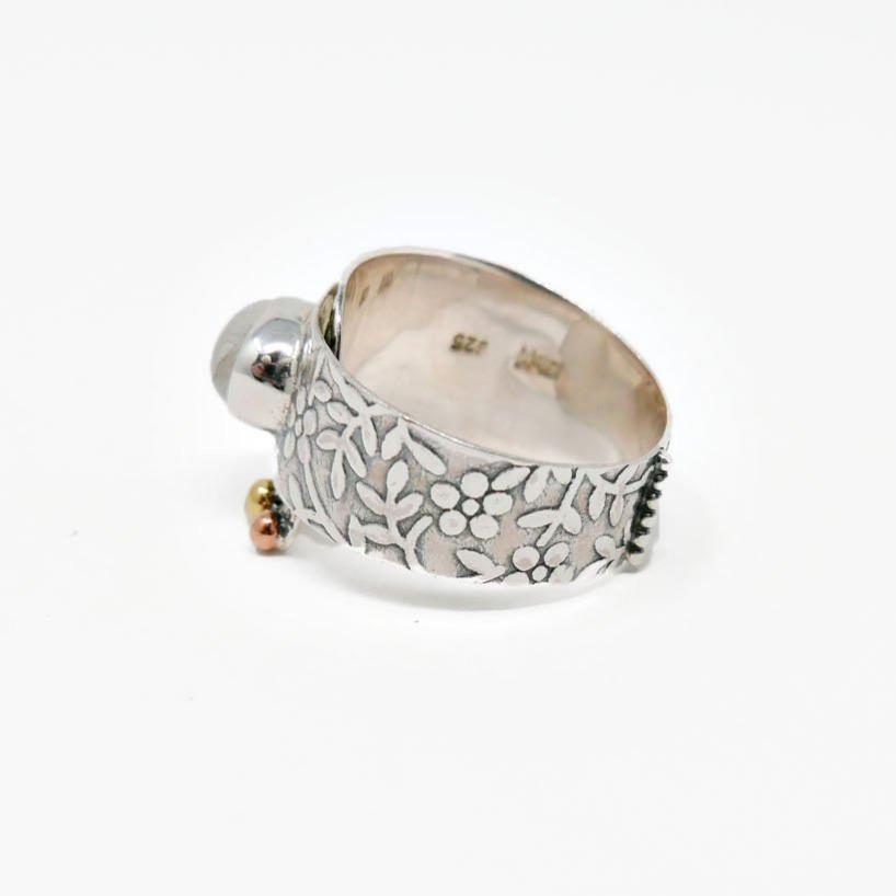 silver ring with flower design merakalpa malas