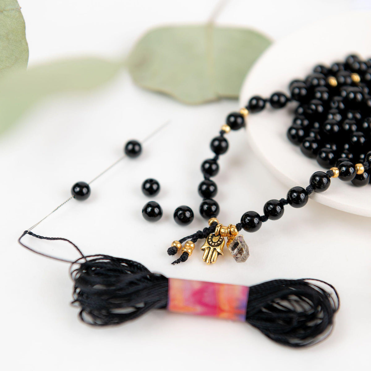 black tourmaline mala beads and healing crystals handmade by merakalpa malas